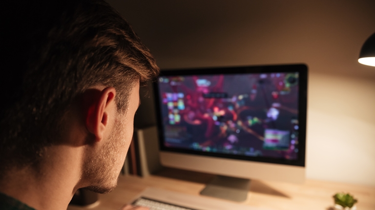 young man playing games on CNY