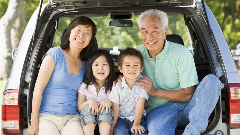 grandparents with grandkids in car
