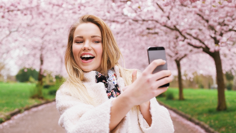 woman taking selfie