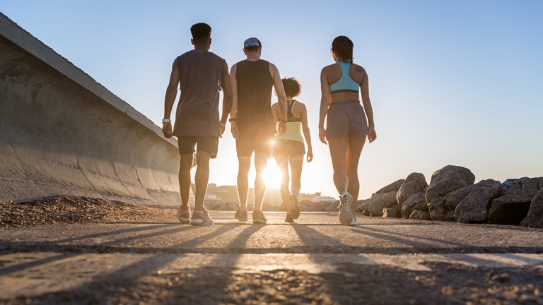 a group of people walking on the road