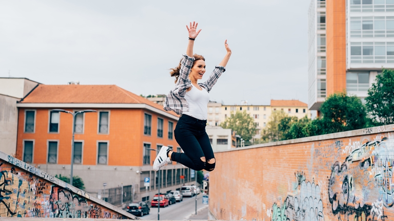 woman jumping in the air